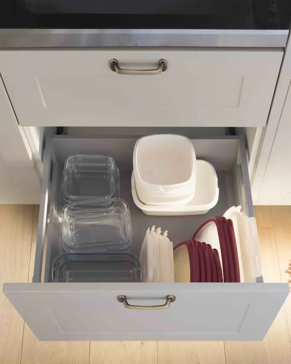 Para ordenar los tuppers, ordena sus bases por un lado y sus tapas por otro